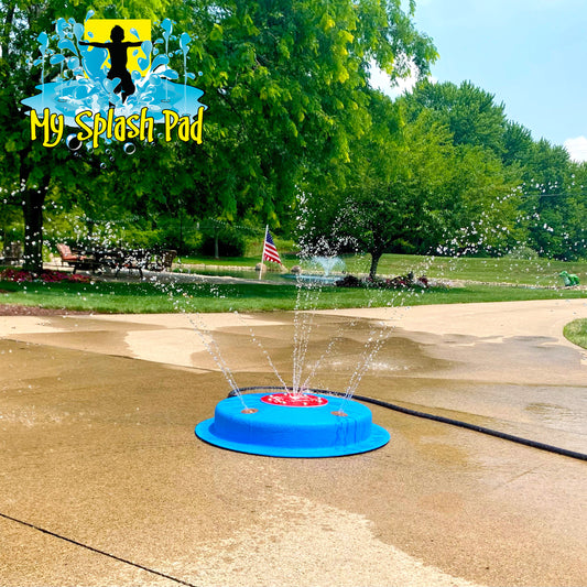 My Splash Pad Mini Splasher Dog Water Park Spray Cool Play. Trees and grass in the background. Sunny day in Ohio.