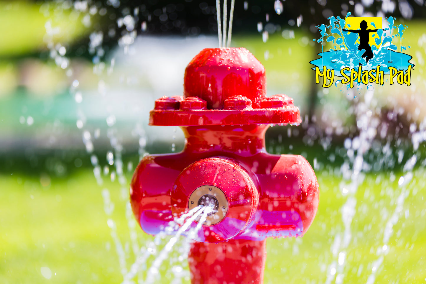 Close-up of Fire Hydrant Portable Splash Pad water play feature spraying water jets, My Splash Pad backyard splash equipment.