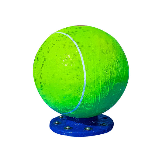 A lime green oversized tennis ball water play feature for dogs with a blue base.