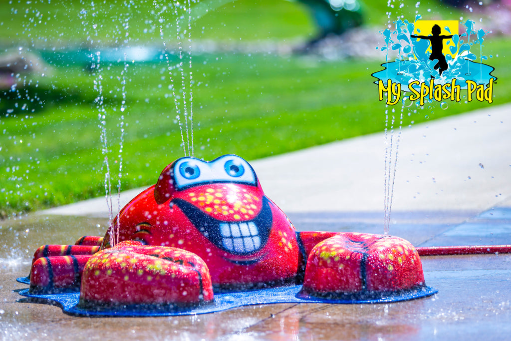 Crab Mobile Spray and Play Features – red crab splash pad spraying water jets from claws and shell, fun backyard water play.